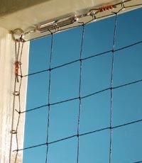 Bird netting installed correctly: a taut, even grid with tightly sealed edges